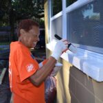 smiling Home Depot volunteer
